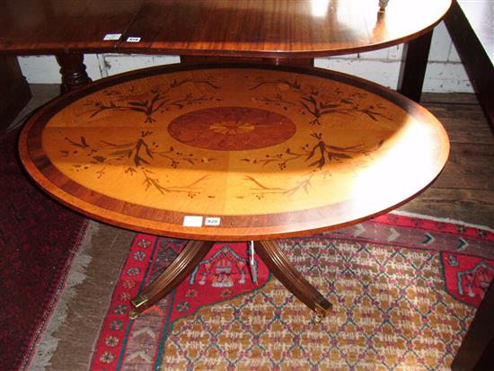 Marquetry inlaid oval coffee table